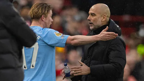 Liverpool FC v Manchester City FC LIVERPOOL, ENGLAND - Sunday, March 10, 2024: Manchester City s Kevin De Bruyne argues with manager Josep Pep Guardiola as he is substituted during the FA Premier League match between Liverpool FC and Manchester City FC at Anfield.