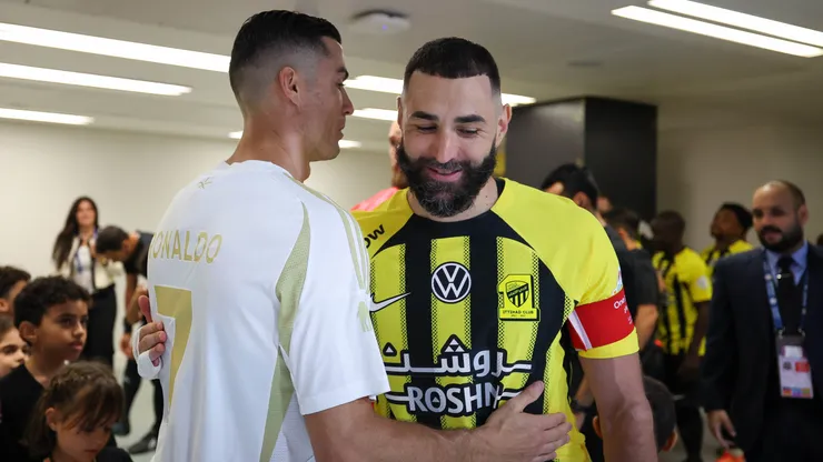 Cristiano Ronaldo of Al Nassr and Karim Benzema of Al Ittihad talk prior the Saudi Pro League match between Al-Ittihad v Al-Nassr at King Abdullah Sports City on December 6, 2024 in Jeddah, Saudi Arabia.