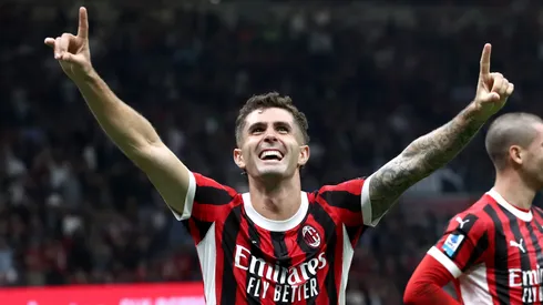 Christian Pulisic of AC Milan celebrates scoring his team's third goal during the Serie A match between AC Milan and Lecce at Stadio Giuseppe Meazza on September 27, 2024 in Milan, Italy.