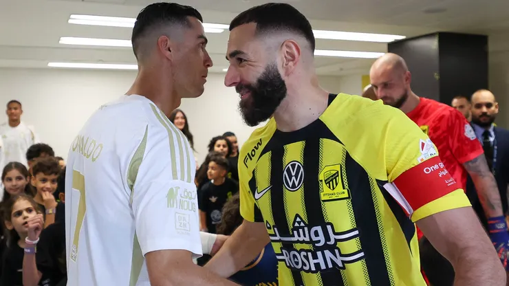 Cristiano Ronaldo of Al Nassr and Karim Benzema of Al Ittihad talk prior the Saudi Pro League match between Al-Ittihad v Al-Nassr at King Abdullah Sports City on December 6, 2024 in Jeddah, Saudi Arabia.