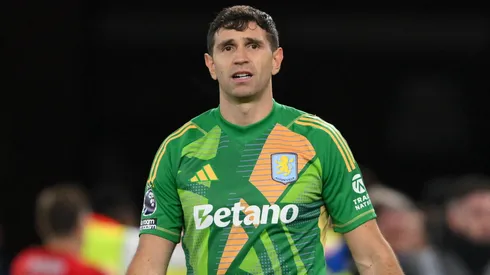 Emiliano Martinez, Aston Villa goalkeeper, looks dejected after Anthony Elanga of Nottingham Forest scores the winning goal during the Premier League match between Nottingham Forest and Aston Villa at the City Ground in Nottingham, England, on December 14, 2024.