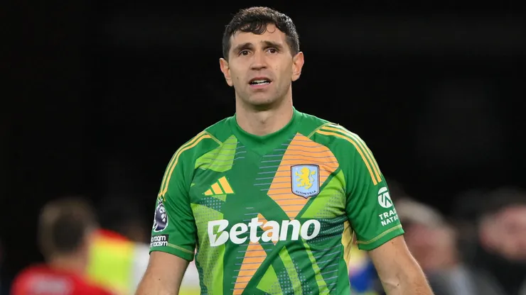 Emiliano Martinez, Aston Villa goalkeeper, looks dejected after Anthony Elanga of Nottingham Forest scores the winning goal during the Premier League match between Nottingham Forest and Aston Villa at the City Ground in Nottingham, England, on December 14, 2024.