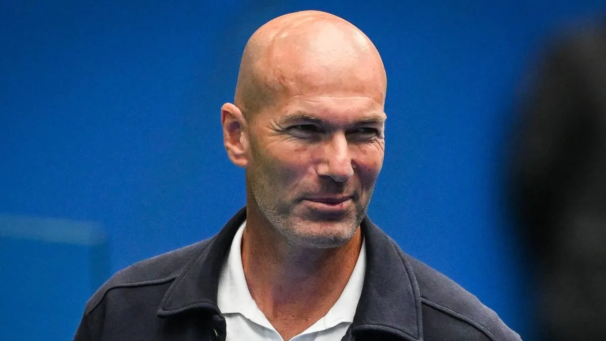 Zinedine Zidane smiling.