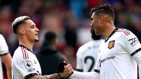 Antony (left) shakes hands with Casemiro at the end of the Premier League match at the City Ground, Nottingham.