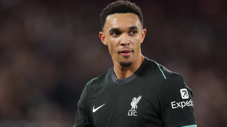 Trent Alexander-Arnold of Liverpool looks on during the Premier League match between West Ham United FC and Liverpool FC at London Stadium on December 29, 2024 in London, England.