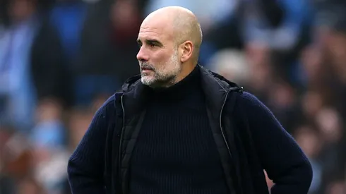 Pep Guardiola, Manager of Manchester City, looks on during the Premier League match between Manchester City FC and Everton FC at Etihad Stadium on December 26, 2024 in Manchester, England.