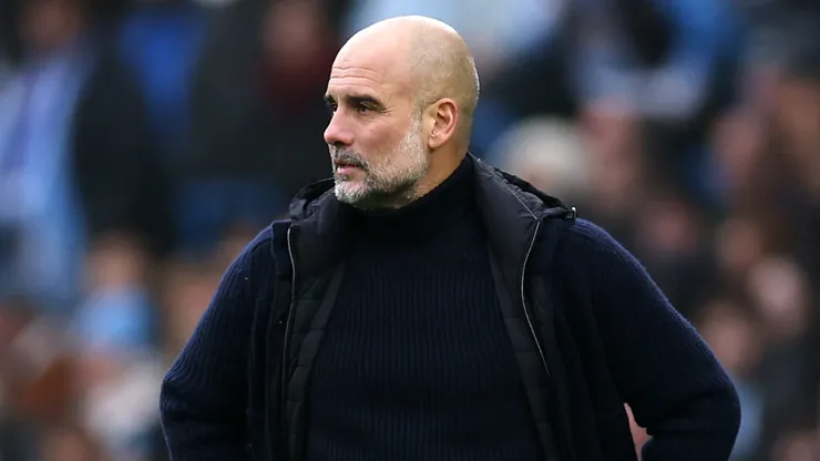 Pep Guardiola, Manager of Manchester City, looks on during the Premier League match between Manchester City FC and Everton FC at Etihad Stadium on December 26, 2024 in Manchester, England.