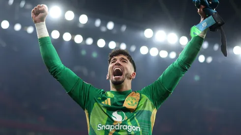 Altay Bayindir of Manchester United celebrates victory in the penalty shoot out after the Emirates FA Cup Third Round match between Arsenal and Manchester United at Emirates Stadium on January 12, 2025 in London, England