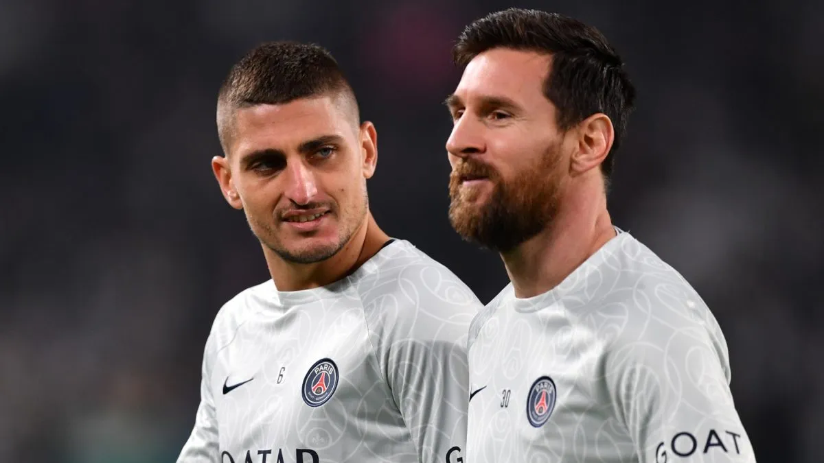 Marco Verratti and Lionel Messi smiling.