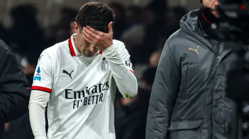 Christian Pulisic of AC Milan shows his dejection after suffering an injury