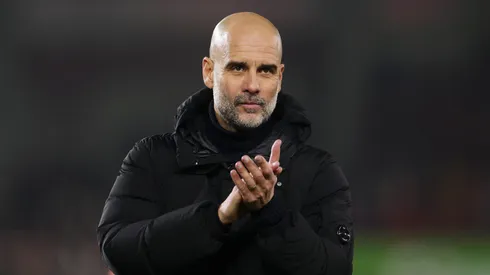 Pep Guardiola, Manager of Manchester City, applauds the fans at full-time following the team's draw following the Premier League match between Brentford FC and Manchester City FC at Gtech Community Stadium on January 14, 2025 in Brentford, England.