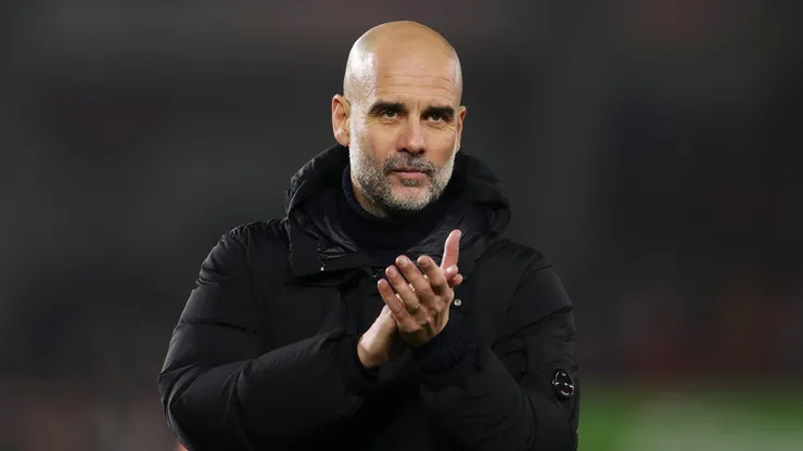 Pep Guardiola, Manager of Manchester City, applauds the fans at full-time following the team's draw following the Premier League match between Brentford FC and Manchester City FC at Gtech Community Stadium on January 14, 2025 in Brentford, England.
