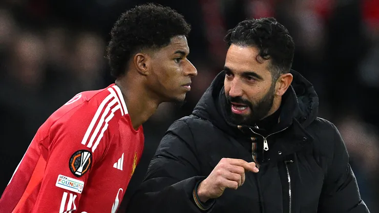 Ruben Amorim, Head Coach of Manchester United, speaks to Marcus Rashford of Manchester United as he prepares to enter the pitch as a substitute during the UEFA Europa League 2024/25 League Phase MD5 match between Manchester United and FK Bodo/Glimt at Old Trafford on November 28, 2024 in Manchester, England.