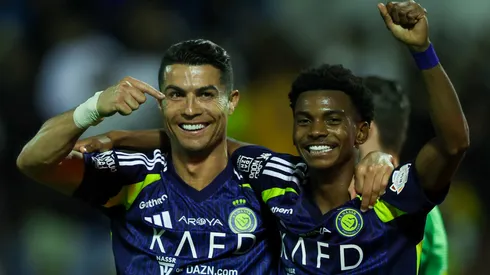 Cristiano Ronaldo of Al Nassr celebrates with teammate Saad Hagawi after scoring the 3rd goal during the Saudi Pro League match between Al Khaleej and Al Nassr at Prince Mohammed bin Fahad Stadium in Dammam on January 21, 2025 in Dammam, Saudi Arabia.