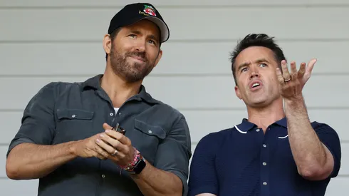 Ryan Reynolds, Owner of Wrexham and Rob McElhenney, Actor and Co-Owner of Wrexham react prior to the Vanarama National League Play-Off Semi Final match between Wrexham and Grimsby Town at Racecourse Ground on May 28, 2022 in Wrexham, Wales.