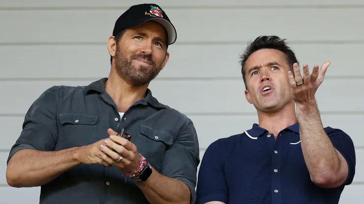 Ryan Reynolds, Owner of Wrexham and Rob McElhenney, Actor and Co-Owner of Wrexham react prior to the Vanarama National League Play-Off Semi Final match between Wrexham and Grimsby Town at Racecourse Ground on May 28, 2022 in Wrexham, Wales.