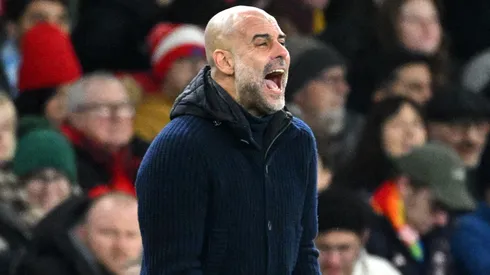 Pep Guardiola, Manager of Manchester City, reacts during the Premier League match between Arsenal FC and Manchester City FC at Emirates Stadium on February 02, 2025 in London, England.