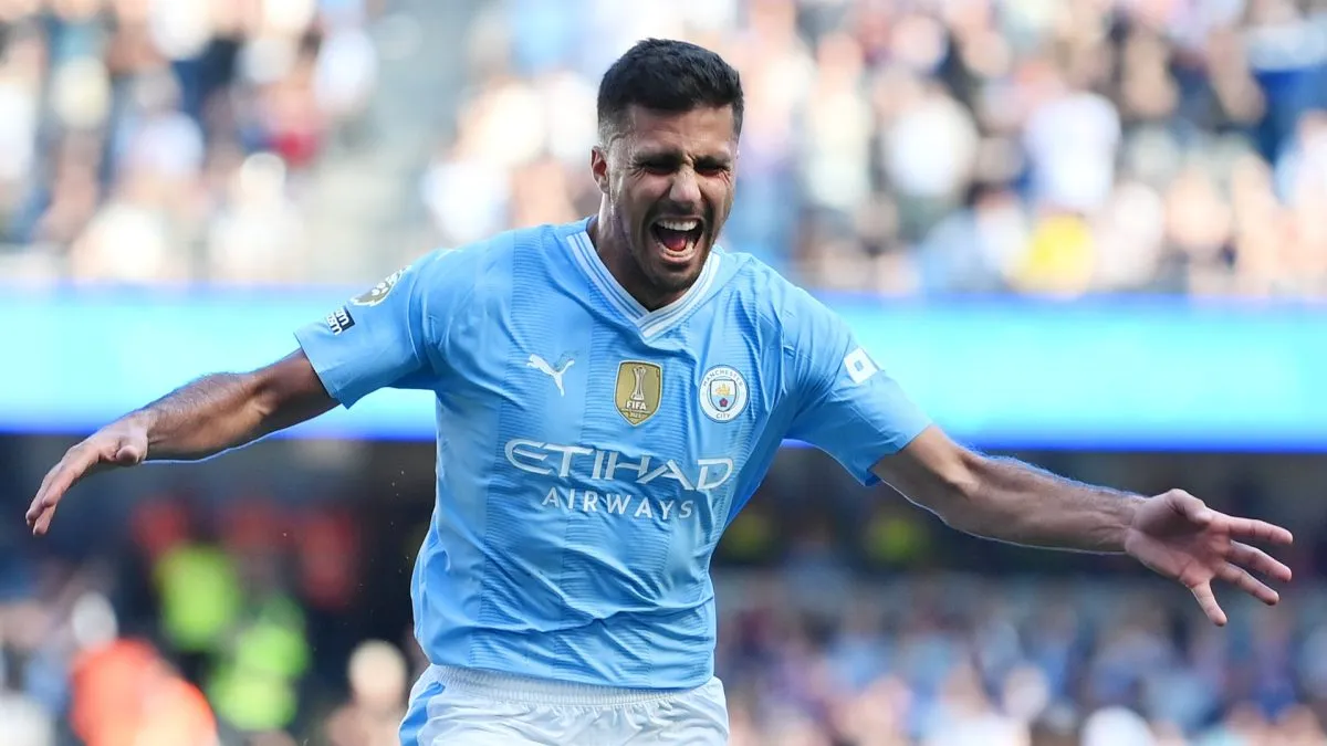 Rodri of Manchester City celebrates scoring his team's third goal during the Premier League match between Manchester City and West Ham United at Etihad Stadium on May 19, 2024 in Manchester, England.