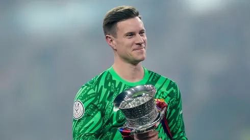 Marc-Andre ter Stegen goalkeeper of Barcelona and Germany lifts the trophy after winning with his team during the Spanish Super Cup final match between Real Madrid and FC Barcelona at King Abdullah Sports City on January 12, 2025 in Jeddah, Saudi Arabia.