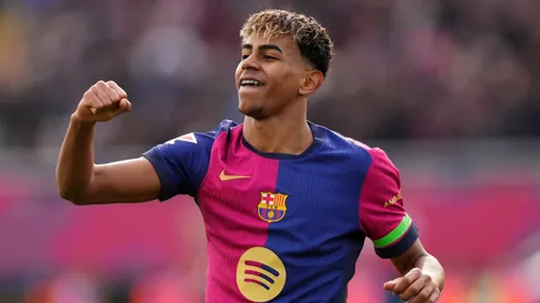 Lamine Yamal of FC Barcelona celebrates after Robert Lewandowski (not pictured) scores his team's first goal during the LaLiga match between FC Barcelona and Deportivo Alaves at Estadi Olimpic Lluis Companys on February 02, 2025 in Barcelona, Spain.
