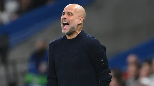 Pep Guardiola, Manager of Manchester City, reacts during the UEFA Champions League 2024/25 League Knockout Play-off second leg match between Real Madrid C.F. and Manchester City at Santiago Bernabeu Stadium on February 19, 2025 in Madrid, Spain.