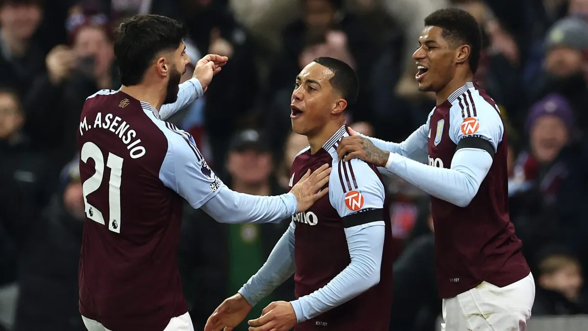 Youri Tielemans of Aston Villa celebrates scoring his team's first goal with teammates Marco Asensio and Marcus Rashford during the Premier League match between Aston Villa FC and Liverpool FC at Villa Park on February 19, 2025 in Birmingham, England.