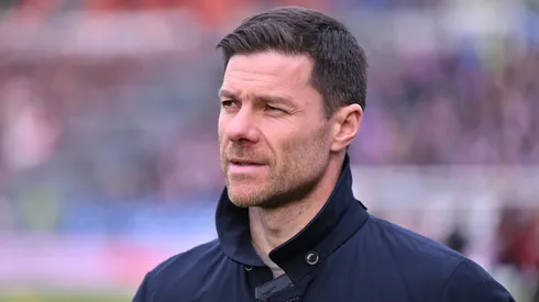 Xabi Alonso, Head Coach of Bayer 04 Leverkusen, looks on prior to the Bundesliga match between Holstein Kiel and Bayer 04 Leverkusen at Holstein-Stadion on February 22, 2025 in Kiel, Germany.