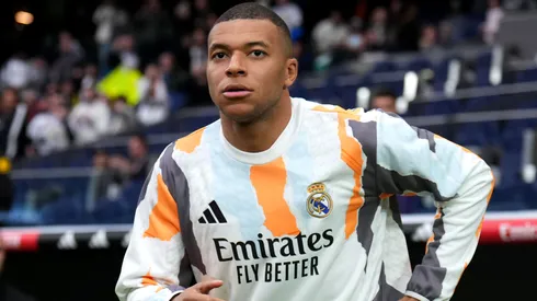 Kylian Mbappe of Real Madrid takes to the field for the warm up prior to the LaLiga match between Real Madrid CF and Girona FC at Estadio Santiago Bernabeu on February 23, 2025 in Madrid,