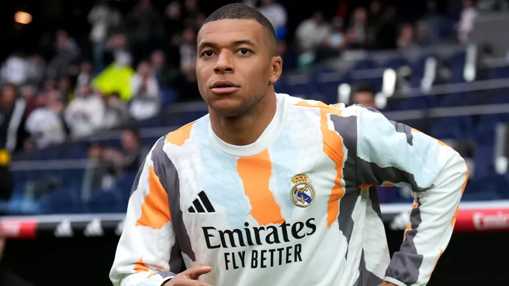 Kylian Mbappe of Real Madrid takes to the field for the warm up prior to the LaLiga match between Real Madrid CF and Girona FC at Estadio Santiago Bernabeu on February 23, 2025 in Madrid,