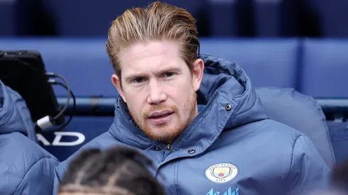 Kevin De Bruyne of Manchester City looks on from the substitute bench prior to the Premier League match between Manchester City FC and Everton FC at Etihad Stadium on December 26, 2024 in Manchester, England.