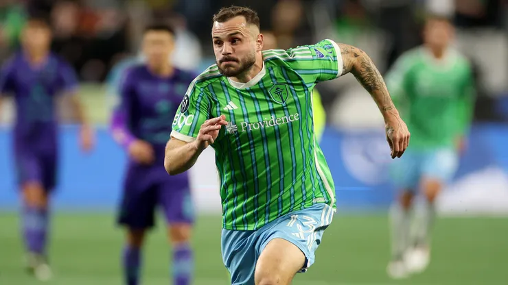 Jordan Morris #13 of Seattle Sounders chases the ball.