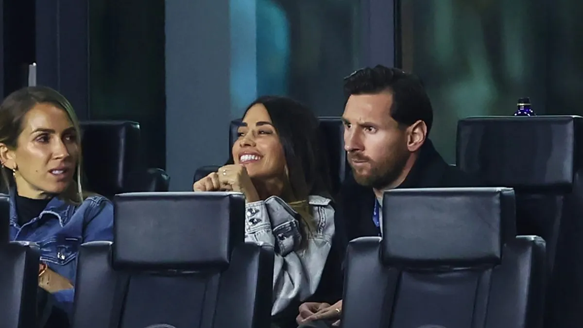 Lionel Messi #10 of Inter Miami CF alongside Antonela Roccuzzo observe from the sidelines during the 2025 Concacaf Champions Cup Round of 16 First Leg match between Inter Miami CF and Cavalier SC at Chase Stadium on March 06, 2025 in Fort Lauderdale, Florida.