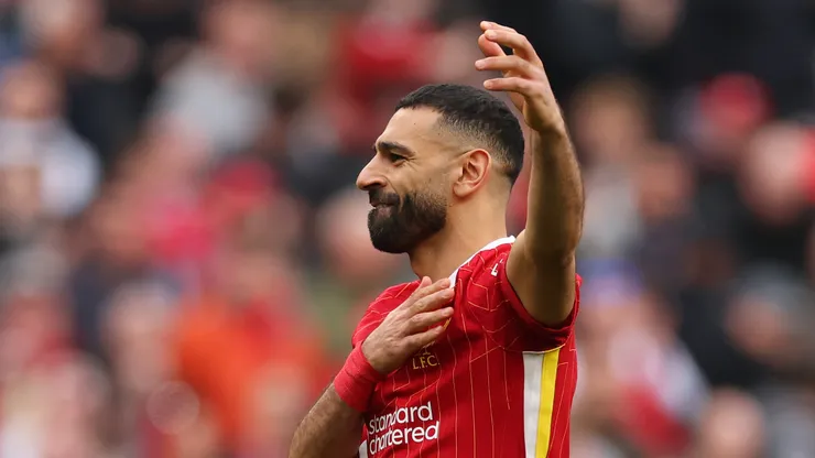 Mohamed Salah of Liverpool celebrates scoring his team's third goal during the Premier League match between Liverpool FC and Southampton FC at Anfield on March 08, 2025 in Liverpool, England.