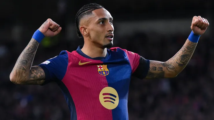 Raphinha of FC Barcelona celebrates their team's second goal during the UEFA Champions League 2024/25 UEFA Champions League 2024/25 Round of 16 Second Leg match between FC Barcelona and SL Benfica at on March 11, 2025 in Barcelona, Spain.