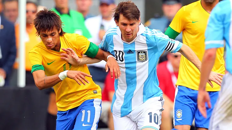 Neymar #11 of Brazil battles Lionel Messi #10 of Argentina during the first half of an international friendly soccer match on June 9, 2012 at MetLife Stadium in East Rutherford, New Jersey.