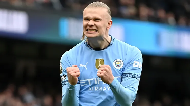 Erling Haaland of Manchester City celebrates after scoring his team's first goal from the penalty spot during the Premier League match between Manchester City FC and Brighton & Hove Albion FC at Etihad Stadium on March 15, 2025 in Manchester, England.