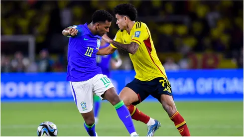 Rodrygo of Brazil battles for possession with Luis Diaz of Colombia