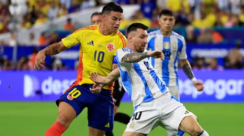 James Rodriguez of Colombia battles for possession with Lionel Messi of Argentina during the CONMEBOL Copa America 2024 Final match between Argentina and Colombia at Hard Rock Stadium on July 14, 2024 in Miami Gardens, Florida.