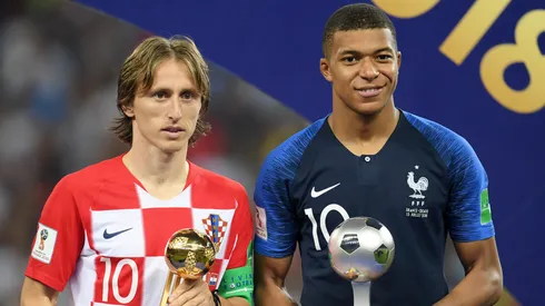 Luka Modric of Croatia poses with his Golden Ball award, alongside Kylian Mbappe of France who poses with his Best Young Player award after the 2018 FIFA World Cup Final between France and Croatia at Luzhniki Stadium on July 15, 2018 in Moscow, Russia.
