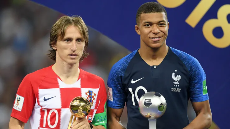 Luka Modric of Croatia poses with his Golden Ball award, alongside Kylian Mbappe of France who poses with his Best Young Player award after the 2018 FIFA World Cup Final between France and Croatia at Luzhniki Stadium on July 15, 2018 in Moscow, Russia.