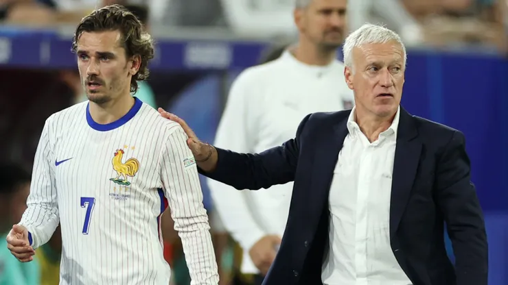 Antoine Griezmann of France interacts with Didier Deschamps, Head Coach of France, during the UEFA EURO 2024 group stage match between Austria and France at Düsseldorf Arena on June 17, 2024 in Dusseldorf, Germany.