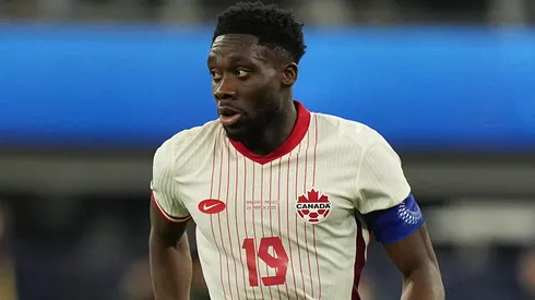 Alphonso Davies #19 of Canada controls the ball against Mexico during the first half of a CONCACAF Nations League semifinal match at SoFi Stadium on March 20, 2025 in Inglewood, California.