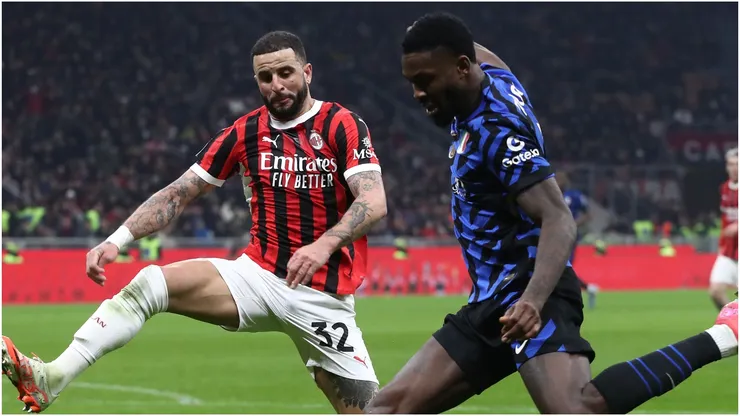 Marcus Thuram of FC Internazionale is challenged by Kyle Walker of AC Milan