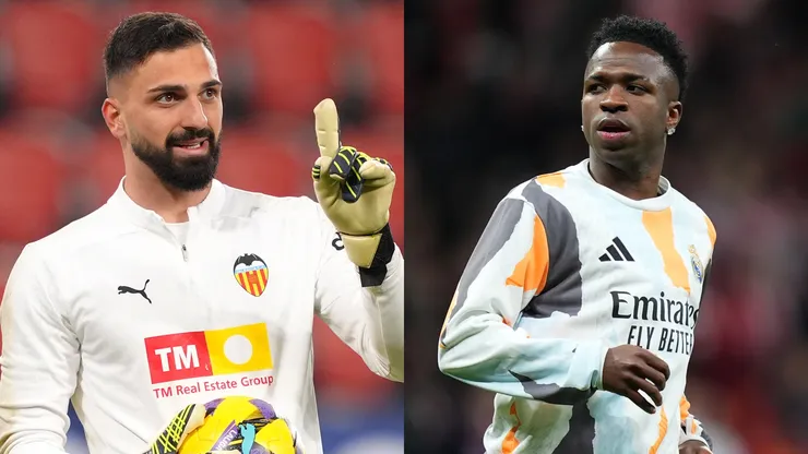 Giorgi Mamardashvili (L) of Valencia CF and Vinicius Junior (R) of Real Madrid.