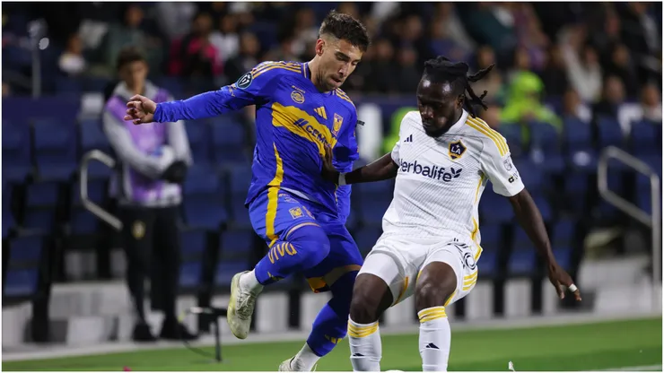Fernando Gorriaran from Tigres UANL fights for the ball against Joseph Paintsil from LA Galaxy