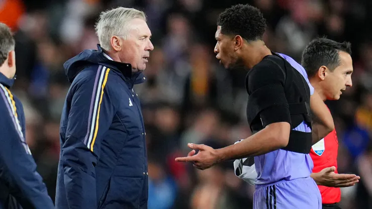Carlo Ancelotti, Head Coach of Real Madrid, and Jude Bellingham of Real Madrid react after he scored a goal which was disallowed in the LaLiga EA Sports match between Valencia CF and Real Madrid CF at Estadio Mestalla on March 02, 2024 in Valencia, Spain.