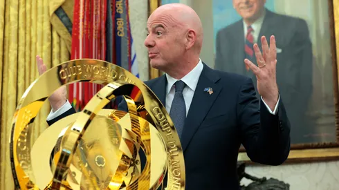 President of Fédération Internationale de Football Association (FIFA) Gianni Infantino (R) unveils the Club World Cup trophy alongside U.S. President Donald Trump in the Oval Office at the White House on March 07, 2025 in Washington, DC. President Trump signed an executive order establishing a White House Task Force for the 2026 World Cup.
