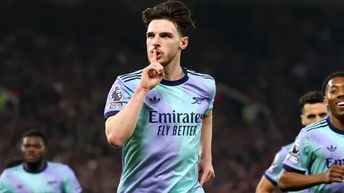Declan Rice of Arsenal celebrates scoring his team's first goal during the Premier League match between Manchester United FC and Arsenal FC at Old Trafford on March 09, 2025 in Manchester, England.