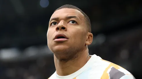 Kylian Mbappe of Real Madrid looks on during the warm up prior to the LaLiga match between Real Madrid CF and Valencia CF at Estadio Santiago Bernabeu on April 05, 2025 in Madrid, Spain.