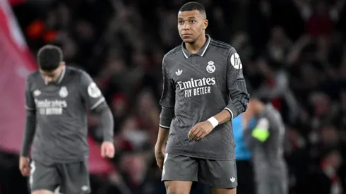 Kylian Mbappe of Real Madrid looks on after Mikel Merino of Arsenal (not pictured) scores his team's third goal during the UEFA Champions League 2024/25 Quarter Final First Leg match between Arsenal FC and Real Madrid C.F. at Emirates Stadium on April 08, 2025 in London, England.